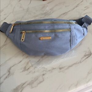 Crossbody Fanny pack for women. Blue with gold zippers . 3 separate zipper areas